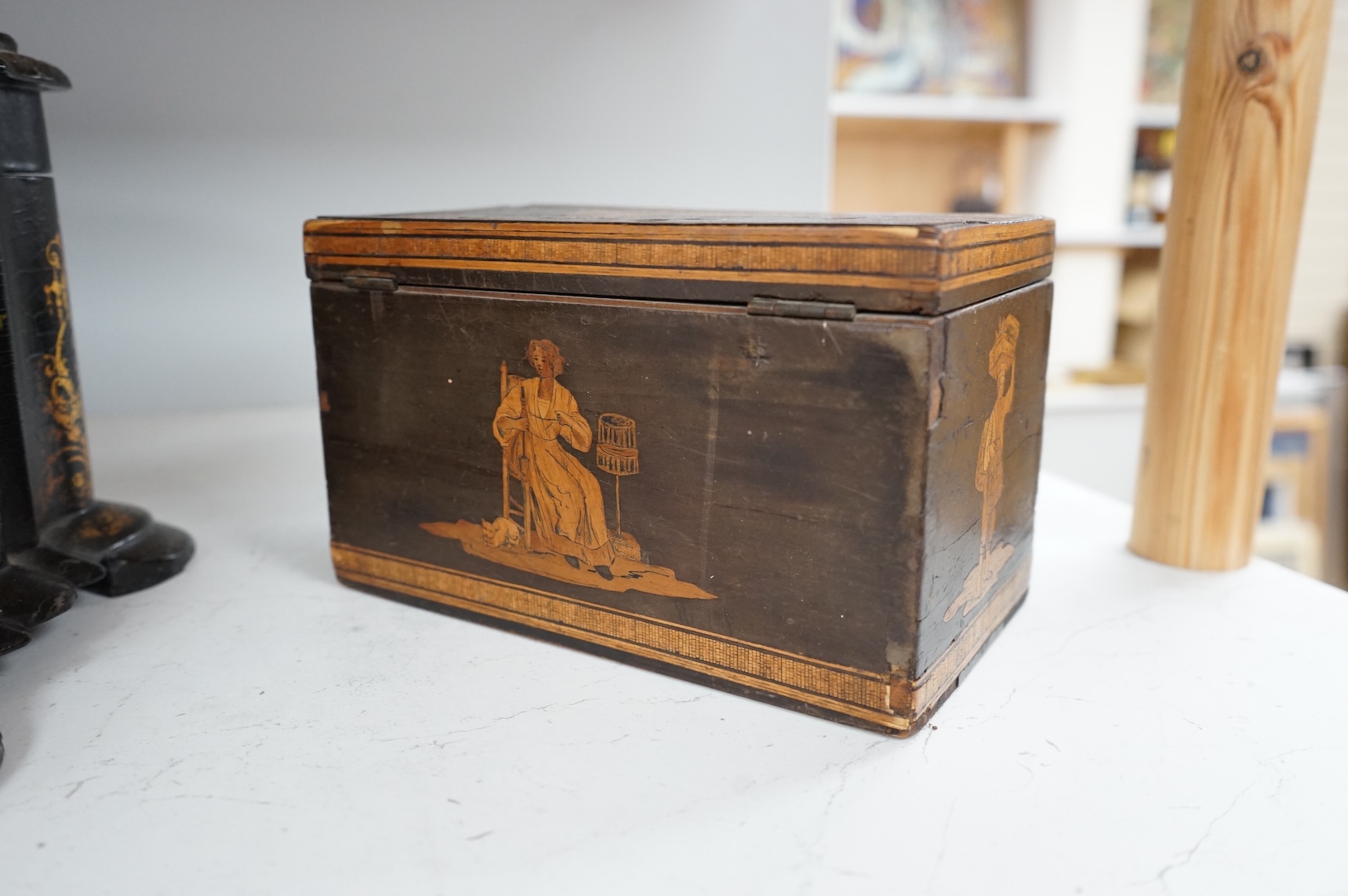 A large Victorian Papier maché and mother-of-pearl tea caddy, 32cm wide, and a Sorrento ware marquetry tea caddy, 19.5cm wide.